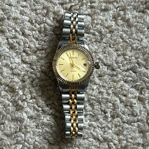 Geneva women’s vintage two tone silver/gold wristwatch‎
